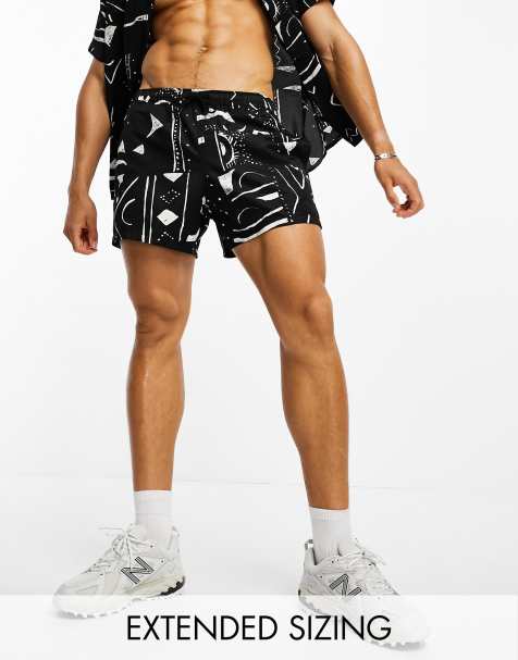 ASOS DESIGN swim shorts co-ord in short length with abstract print - view 1