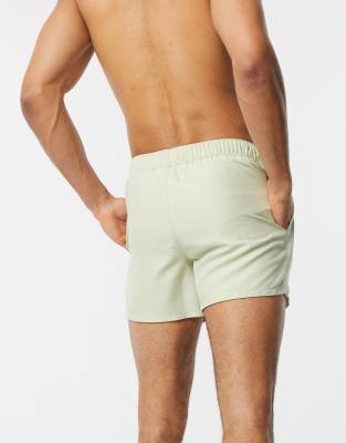 beige swim shorts