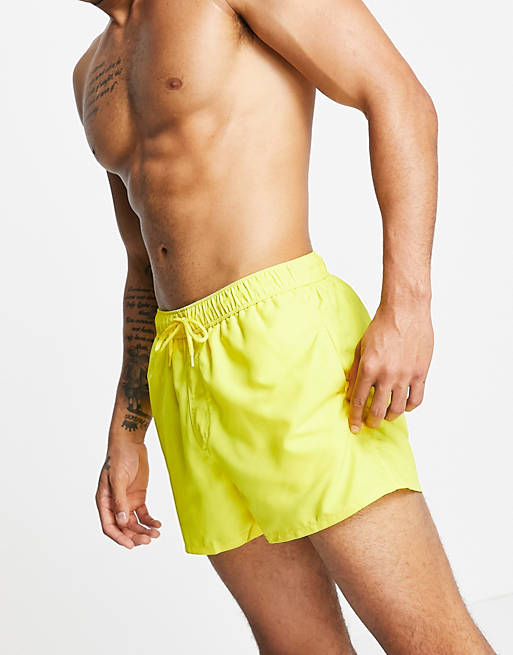 ASOS DESIGN swim shorts in bright yellow short length | ASOS