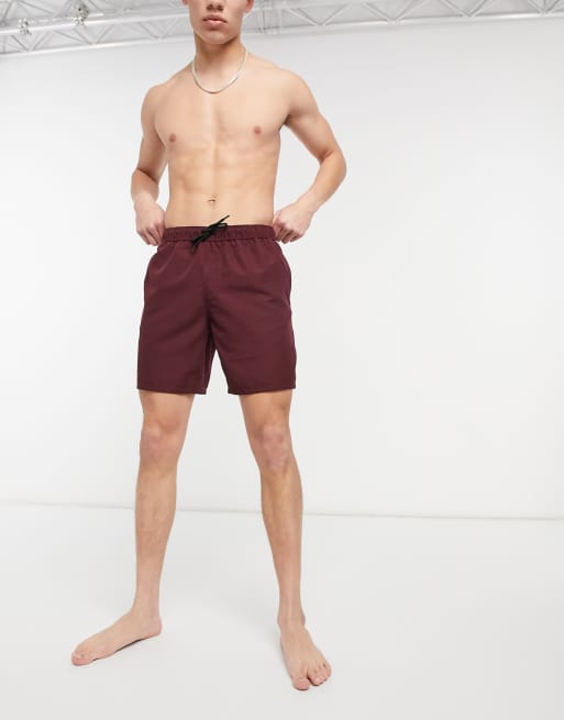 ASOS DESIGN swim shorts in burgundy mid length ASOS