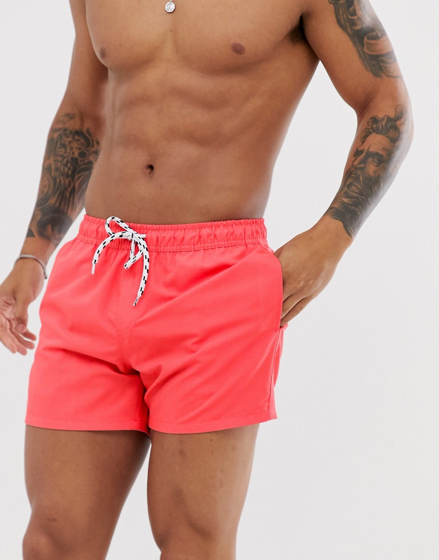 ASOS DESIGN swim shorts in coral short length with contrast drawcord-Pink