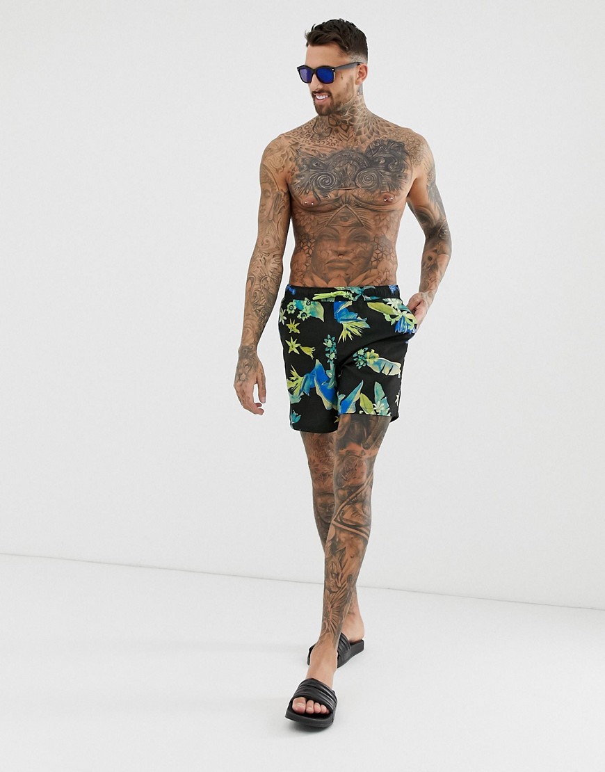 ASOS DESIGN swim shorts in dark based floral print in mid length-Black