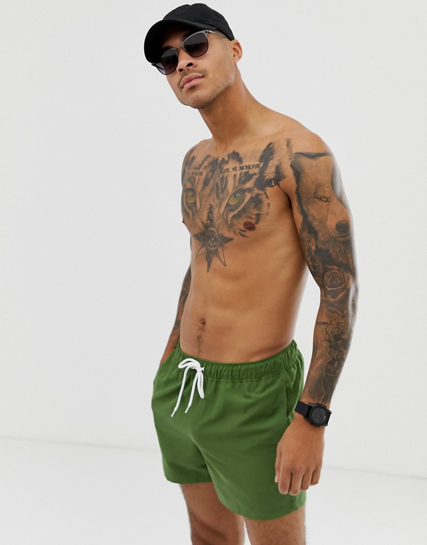 ASOS DESIGN swim shorts in khaki in short length-Green