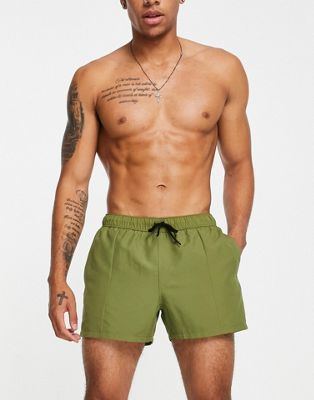 ASOS DESIGN swim shorts in khaki with pin tuck in short length