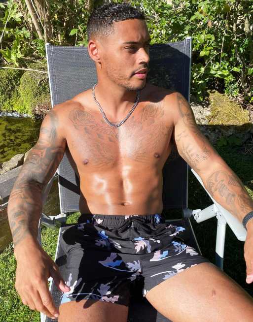 ASOS DESIGN swim shorts in leaf print in short length