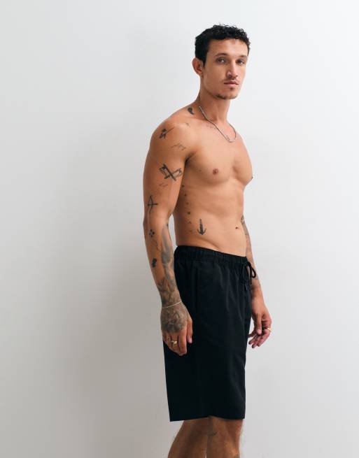ASOS DESIGN swim shorts in long length in black, 3 of 5