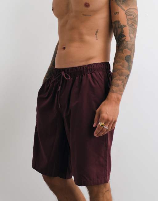 ASOS DESIGN swim shorts in long length in burgundy, 5 of 5