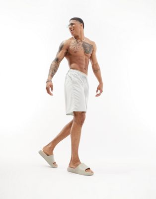 ASOS DESIGN swim shorts in long length in light grey