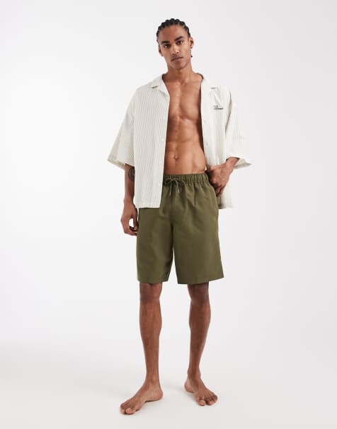 ASOS DESIGN swim shorts in long length in khaki - view 1
