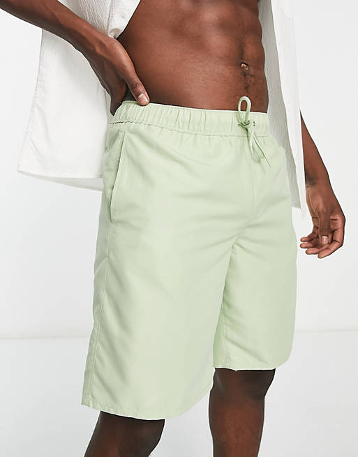ASOS DESIGN swim shorts in long length in light green | ASOS