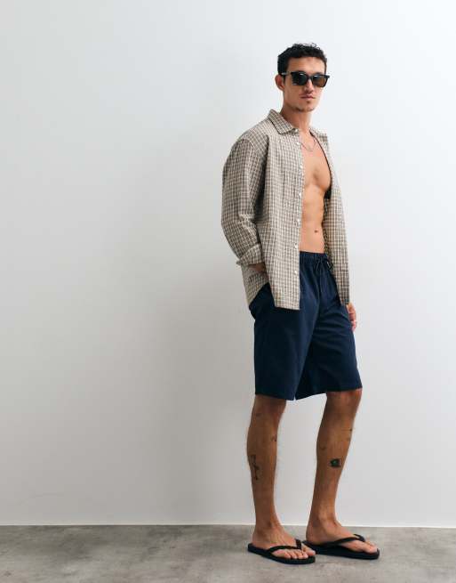 ASOS DESIGN swim shorts in long length in navy, 3 of 5
