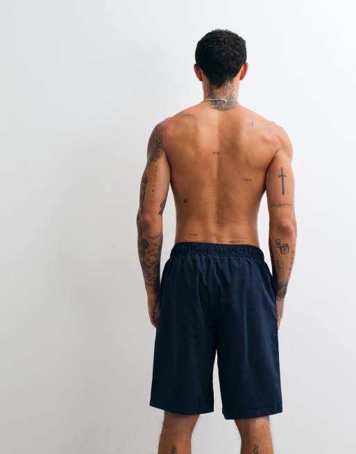 ASOS DESIGN swim shorts in long length in navy, 4 of 5