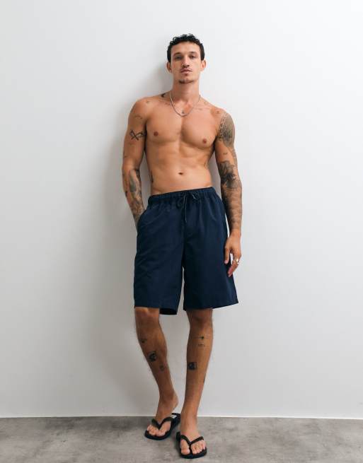 ASOS DESIGN swim shorts in long length in navy, 5 of 5