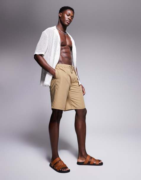 ASOS DESIGN swim shorts in long length in neutral - view 1