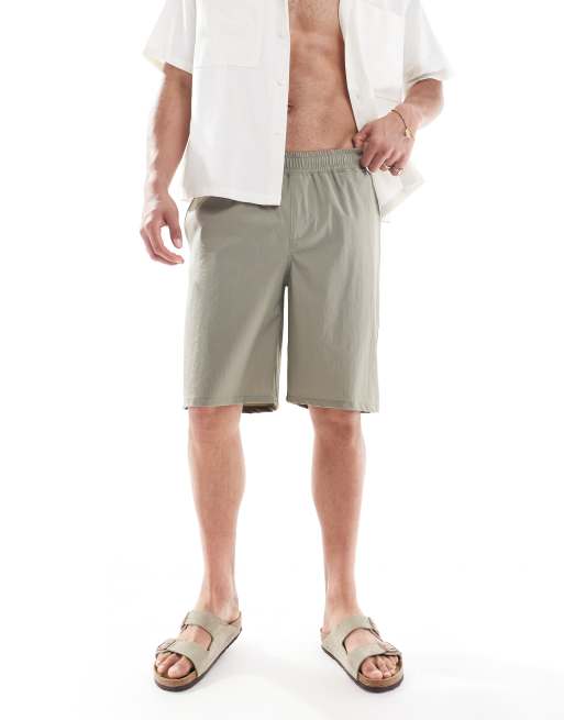 ASOS DESIGN swim shorts in long length in sage green, 4 of 4