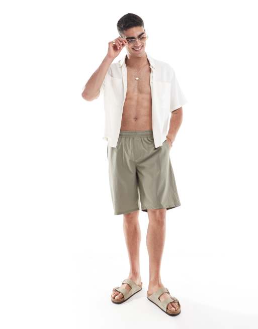 ASOS DESIGN swim shorts in long length in sage