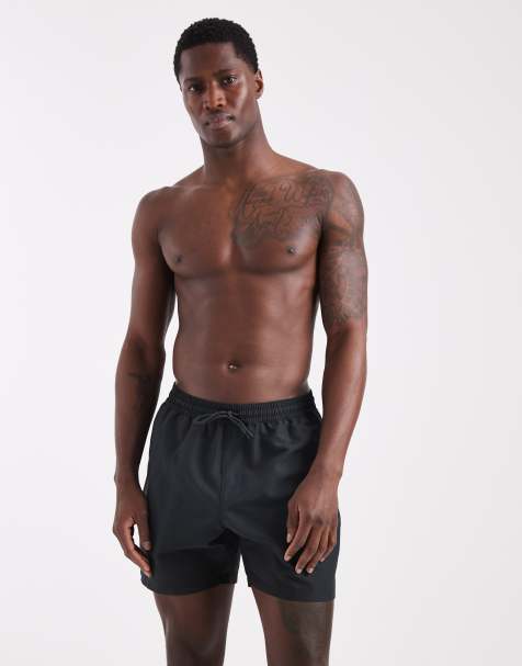 ASOS DESIGN swim shorts in mid length in black