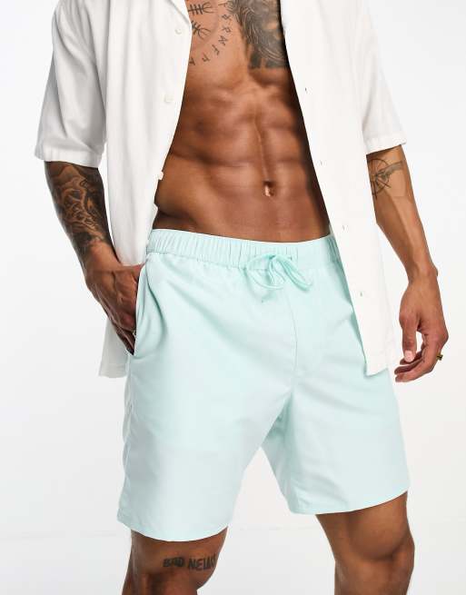 ASOS DESIGN swim shorts in mid length in blue ASOS