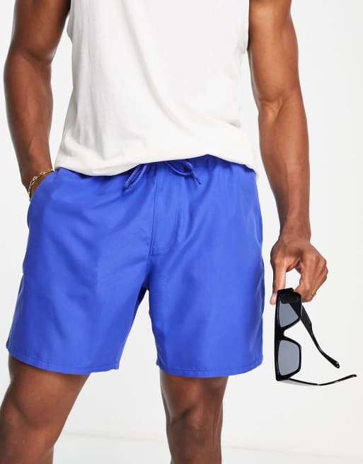 ASOS DESIGN swim shorts in mid length in bright blue