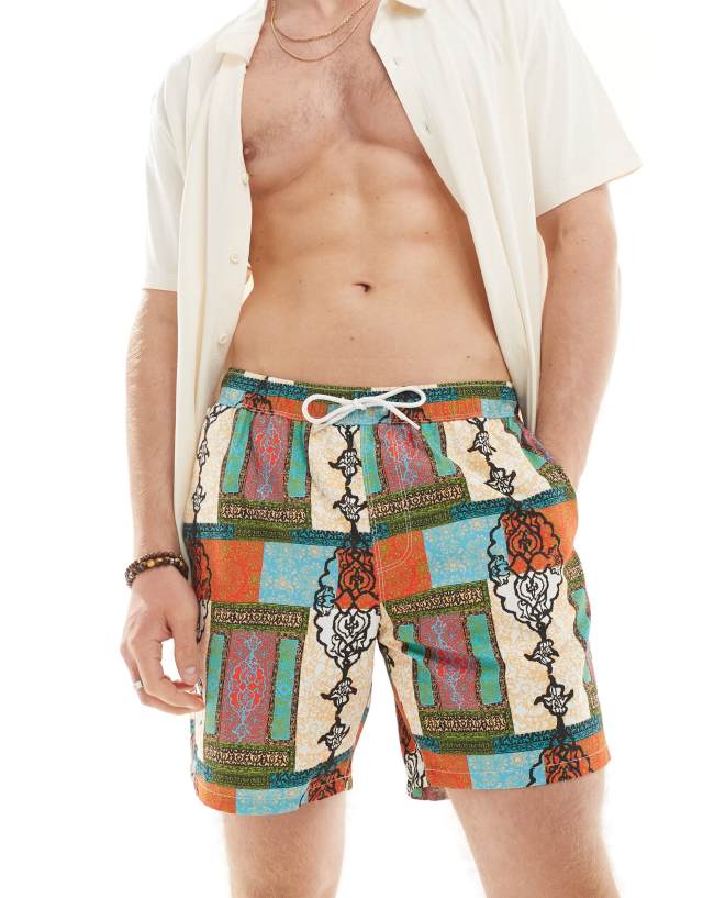 ASOS DESIGN - swim shorts in mid length in bright patchwork print