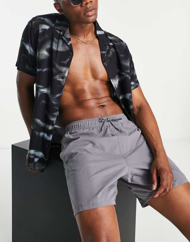 ASOS DESIGN swim shorts in mid length in charcoal