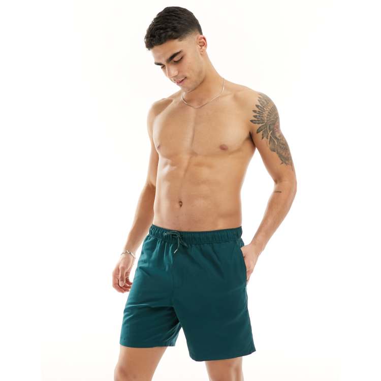ASOS DESIGN swim shorts in mid length in forest green | ASOS
