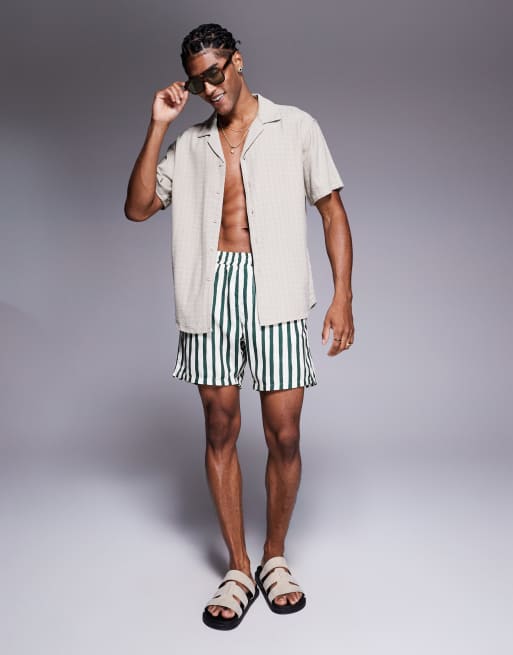 ASOS DESIGN swim shorts in mid length in green stripe, 3 of 4