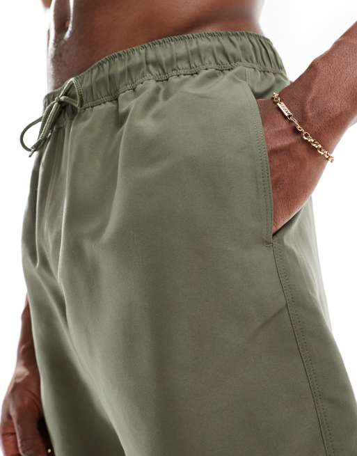 ASOS DESIGN swim shorts in mid length in khaki, 3 of 4