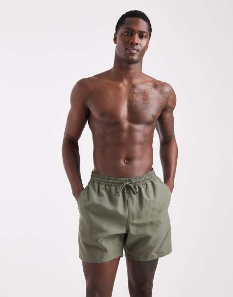 ASOS DESIGN swim shorts in mid length in khaki