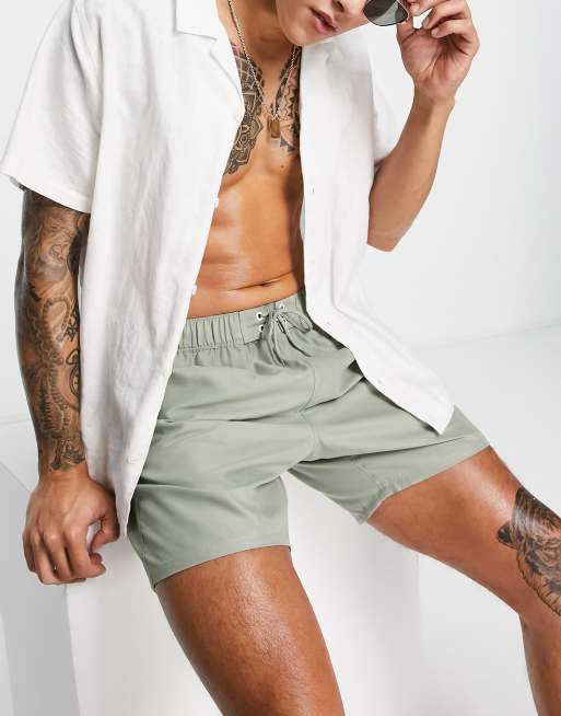 ASOS DESIGN swim shorts in mid length in light khaki