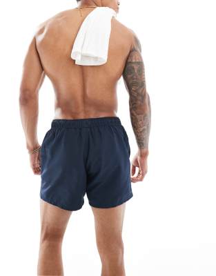 ASOS DESIGN swim shorts in mid length in navy