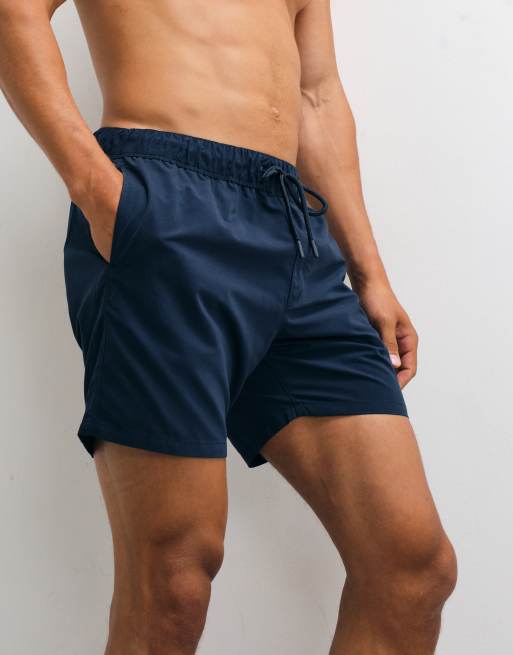 ASOS DESIGN swim shorts in mid length in navy, 4 of 5