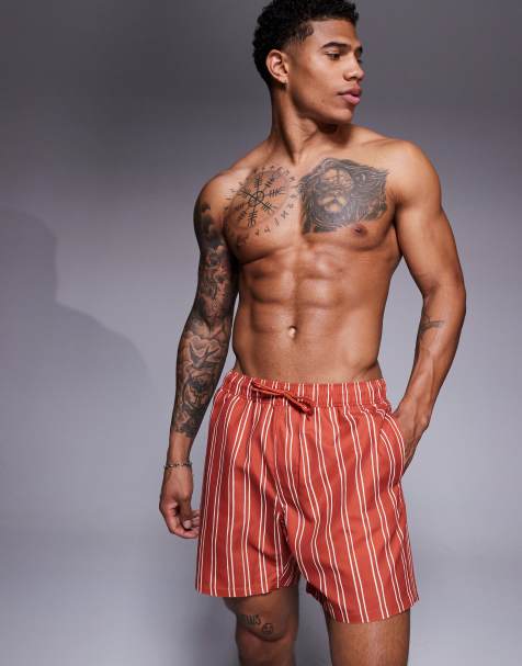 ASOS DESIGN swim shorts in mid length in orange stripe - view 1