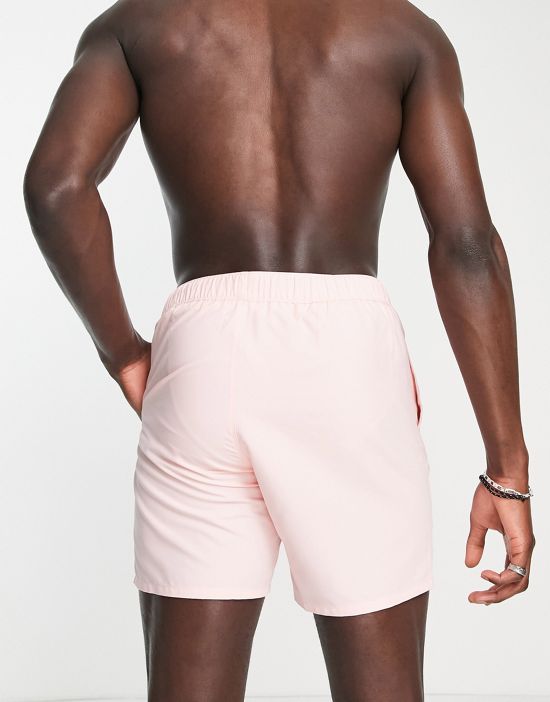 https://images.asos-media.com/products/asos-design-swim-shorts-in-mid-length-in-pastel-pink/201534860-2?$n_550w$&wid=550&fit=constrain