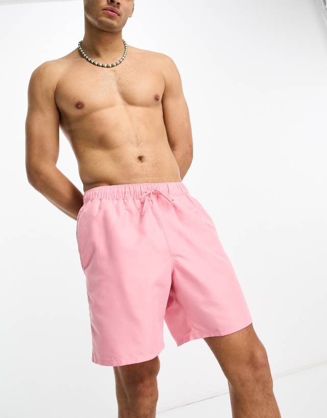 ASOS DESIGN swim shorts in mid length in pink