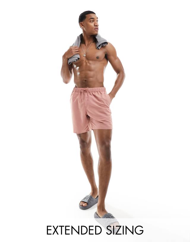 ASOS DESIGN - swim shorts in mid length in pink