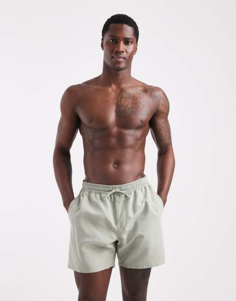 ASOS DESIGN swim shorts in mid length in sage green