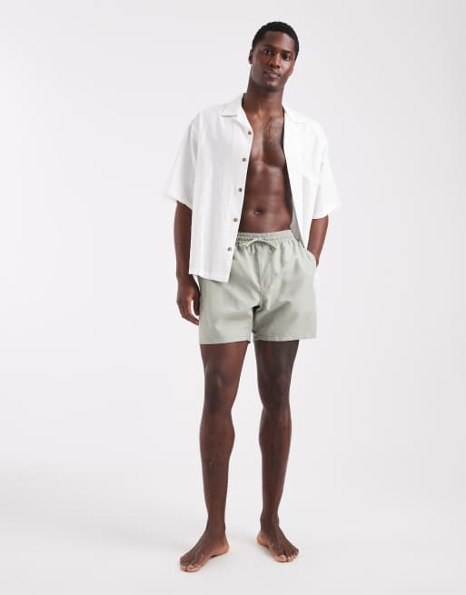 ASOS DESIGN swim shorts in mid length in sage green, 2 of 5
