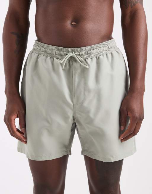 ASOS DESIGN swim shorts in mid length in sage green, 4 of 5