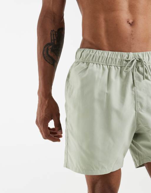 ASOS DESIGN swim shorts in mid length in sage green, 5 of 5