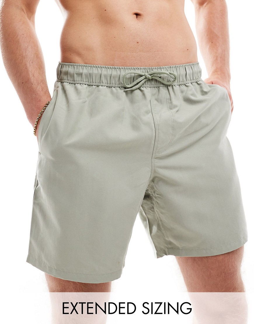 ASOS DESIGN swim shorts in mid length in sage-Green