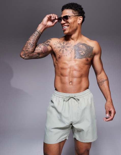 ASOS DESIGN swim shorts in mid length in sage - view 1