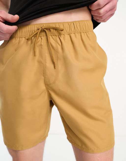 ASOS DESIGN swim shorts in mid length in tan