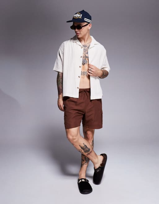 ASOS DESIGN swim shorts in mid length with cargo pockets in dark brown , 2 of 4