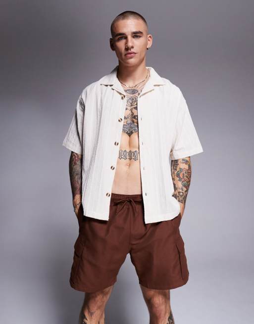 ASOS DESIGN swim shorts in mid length with cargo pockets in dark brown , 3 of 4
