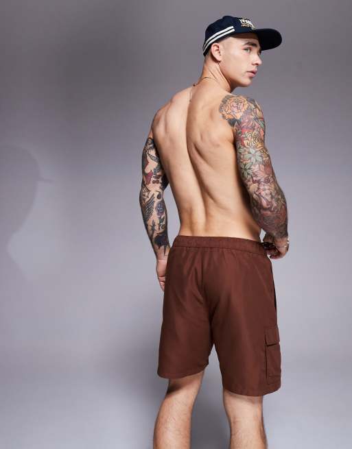 ASOS DESIGN swim shorts in mid length with cargo pockets in dark brown , 4 of 4