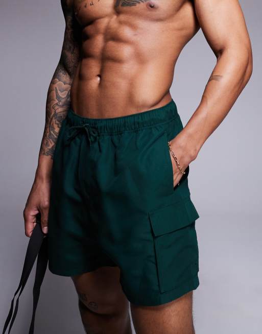 ASOS DESIGN swim shorts in mid length with cargo pockets in green, 3 of 4