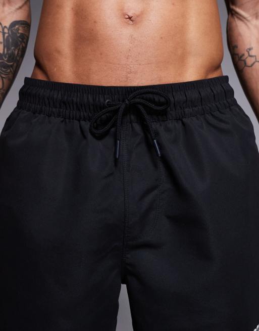 ASOS DESIGN swim shorts in mid length with embroidery in black, 4 of 5
