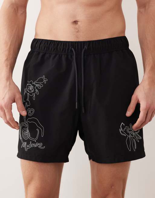 ASOS DESIGN swim shorts in mid length with floral placement print in black, 4 of 5