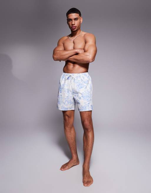 ASOS DESIGN swim shorts in mid length with floral print in blue, 3 of 4